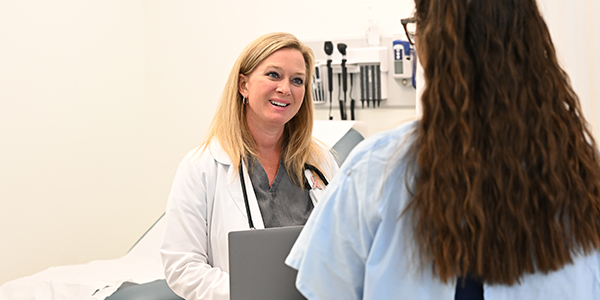 Female doctor with a patient.