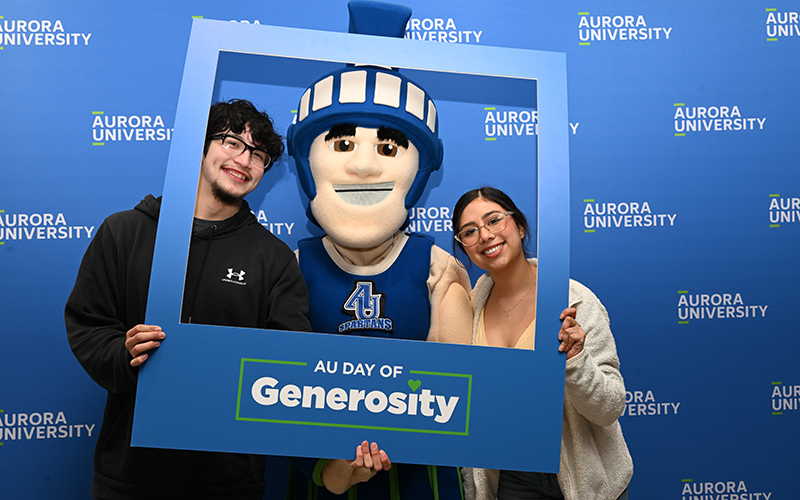 Students posing with Sammy Spartan.