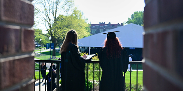 graduates overlooking the quad
