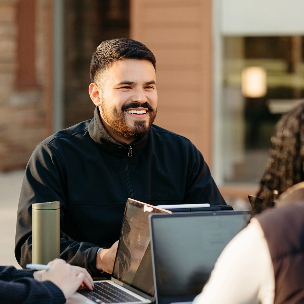 Student with a laptop.