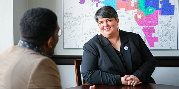 Social worker with client.